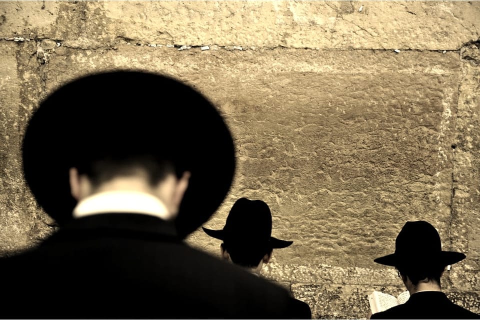 Why Do Charedim Wear Black Hats and Jackets for Davening (Prayers)?